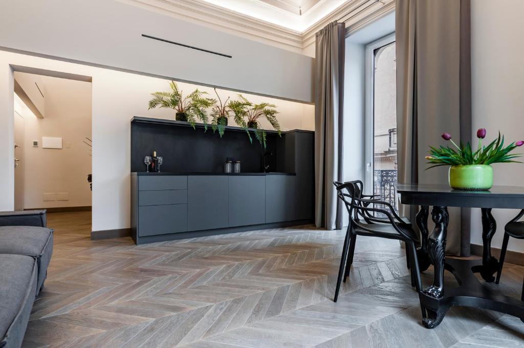 A seating area at Ferrini Home - Etnea Portrait