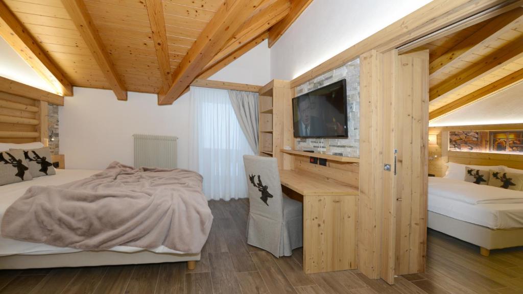 Posteľ alebo postele v izbe v ubytovaní Hotel Gardenia
