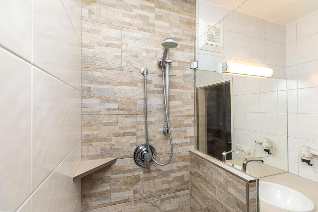 Koupelna v ubytování Hotel Pongauerhof