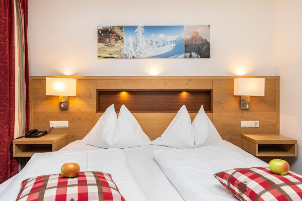 Postel nebo postele na pokoji v ubytování Hotel Pongauerhof