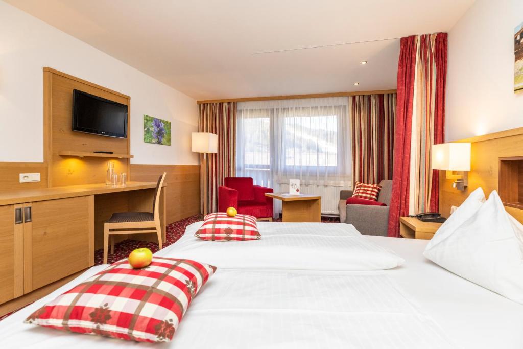 Postel nebo postele na pokoji v ubytování Hotel Pongauerhof