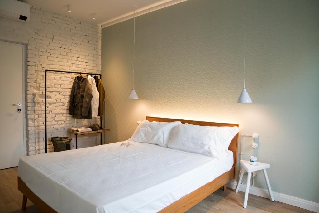 Postel nebo postele na pokoji v ubytování Santa Chiara 11 - Rooms -Verona