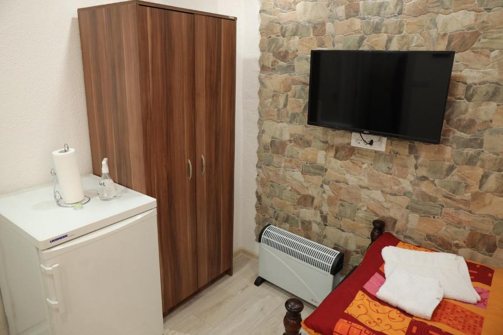 TV a/nebo společenská místnost v ubytování Apartmani Zlatarski DAR