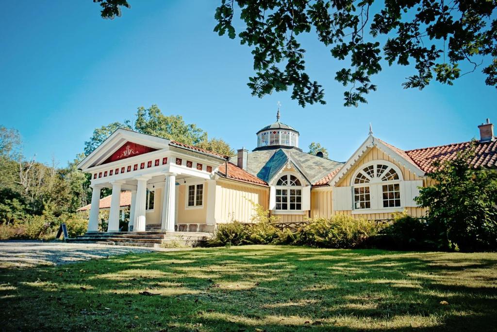 a large house with a turret at Skärva Herrgård in Karlskrona