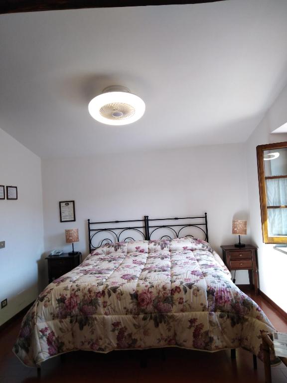 Posteľ alebo postele v izbe v ubytovaní Albergo Giovanni Da Verrazzano