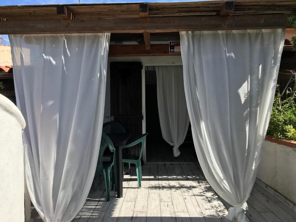 Balkón alebo terasa v ubytovaní Villaggio Tamerici IUN Q7142
