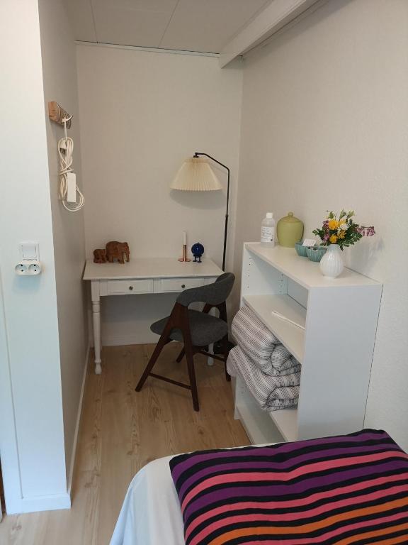 Postel nebo postele na pokoji v ubytování Rosenhuset