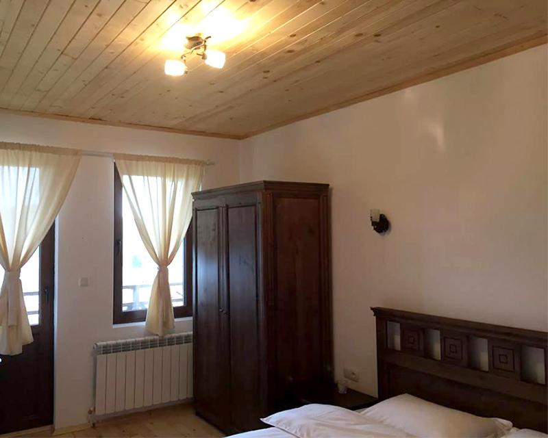 Postel nebo postele na pokoji v ubytování КАЛПАЦИТЕ - Kalpacite Guest Houses