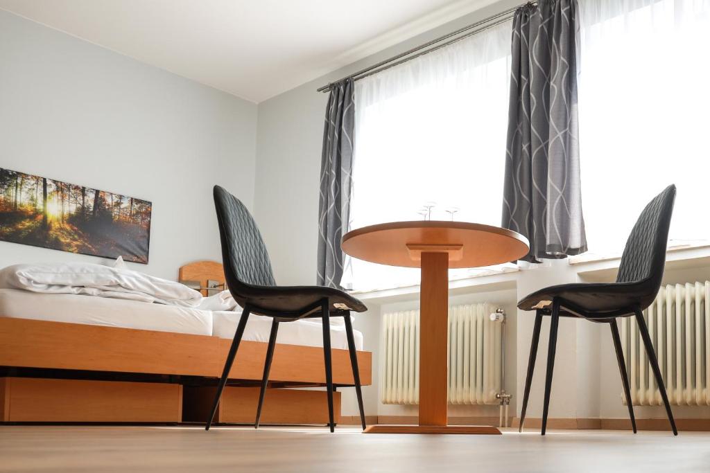 Postel nebo postele na pokoji v ubytování Hotel & Gasthof Wagner