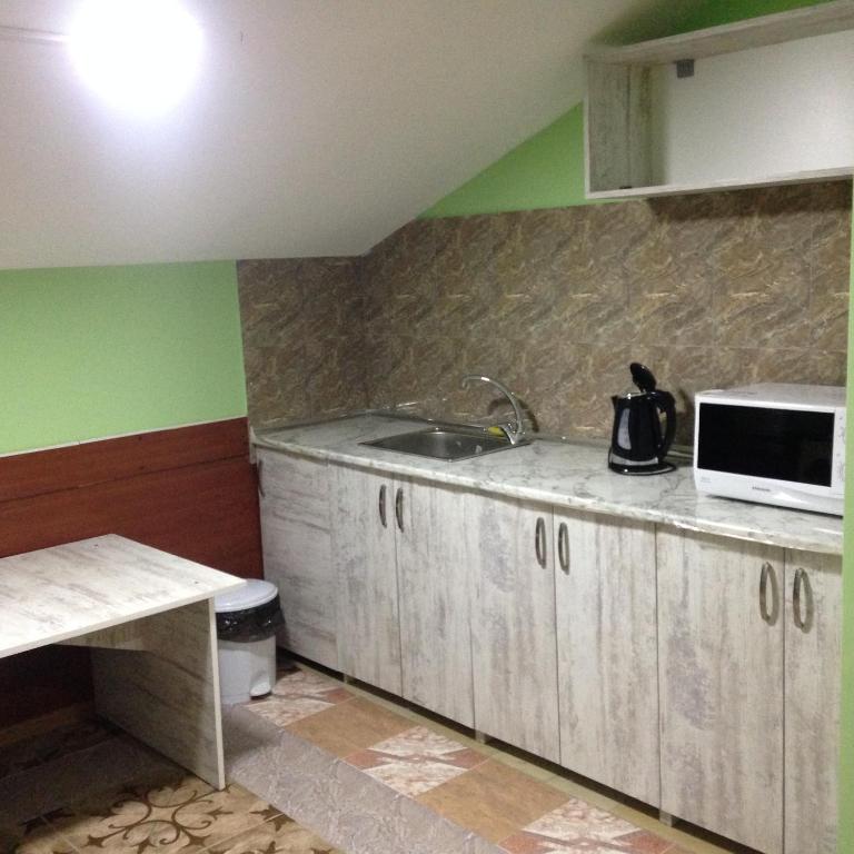 Kuchyň nebo kuchyňský kout v ubytování Hostel Portal