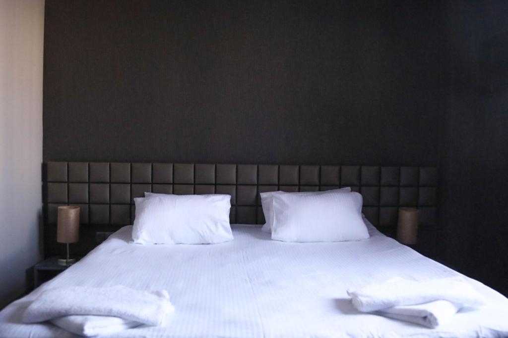 Postel nebo postele na pokoji v ubytování Boutique Hotel Kanyon