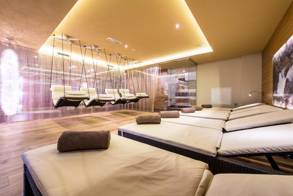 Ένα ή περισσότερα κρεβάτια σε δωμάτιο στο Hotel Sigmunderhof