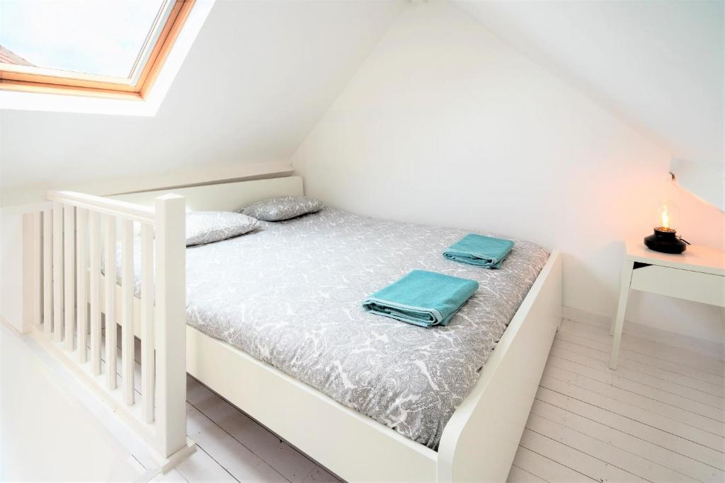 Letto o letti in una camera di Beautiful Cozy Apartments in the Heart of Antwerp