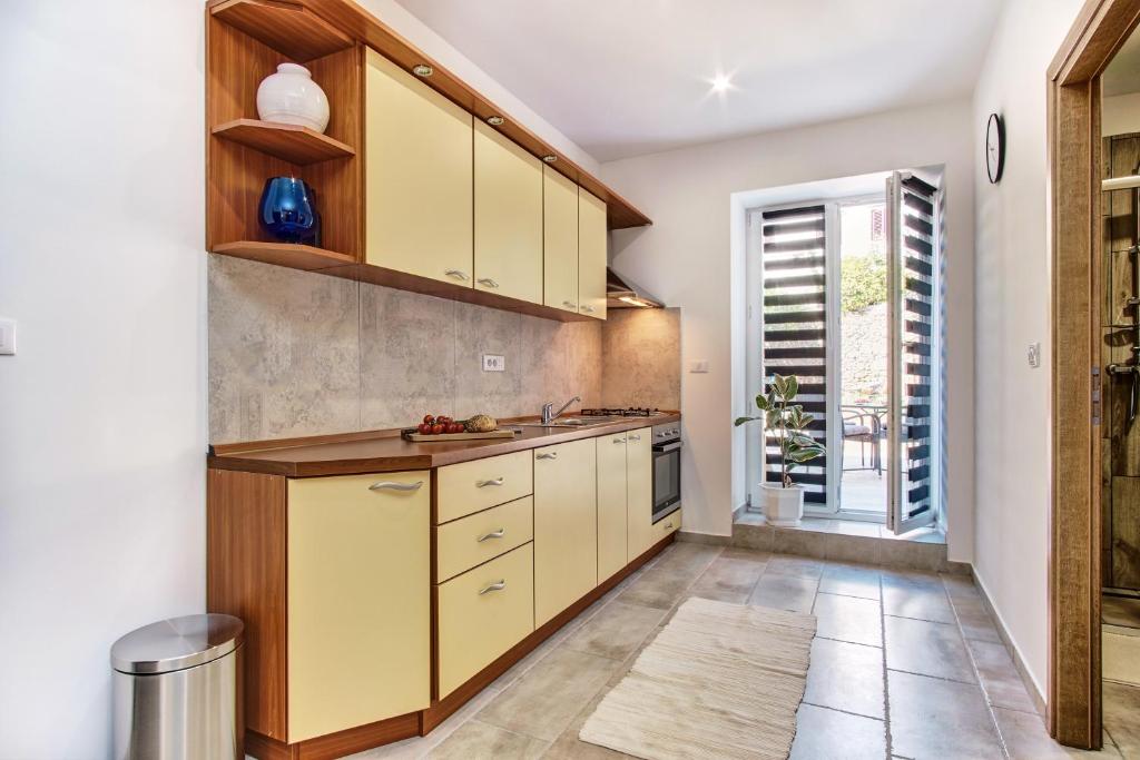 Kuchyňa alebo kuchynka v ubytovaní SkyGarden House
