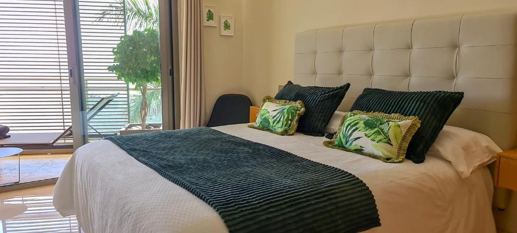 Postel nebo postele na pokoji v ubytování Apartamento El Atardecer