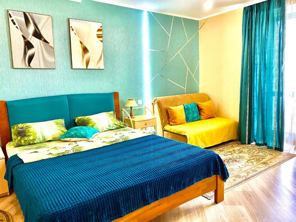 Ένα ή περισσότερα κρεβάτια σε δωμάτιο στο Cozy studio