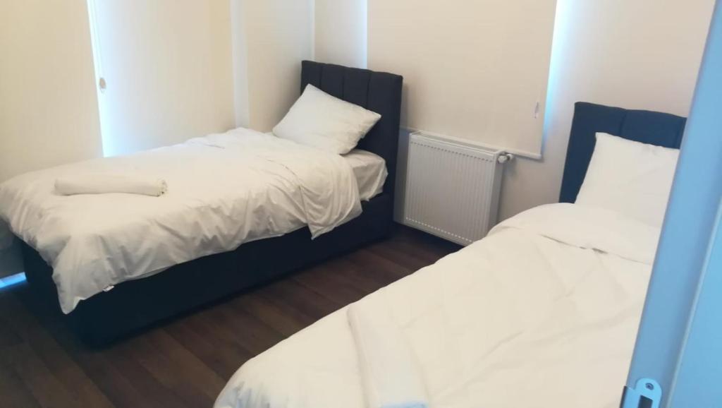 Postel nebo postele na pokoji v ubytování Meral Resort