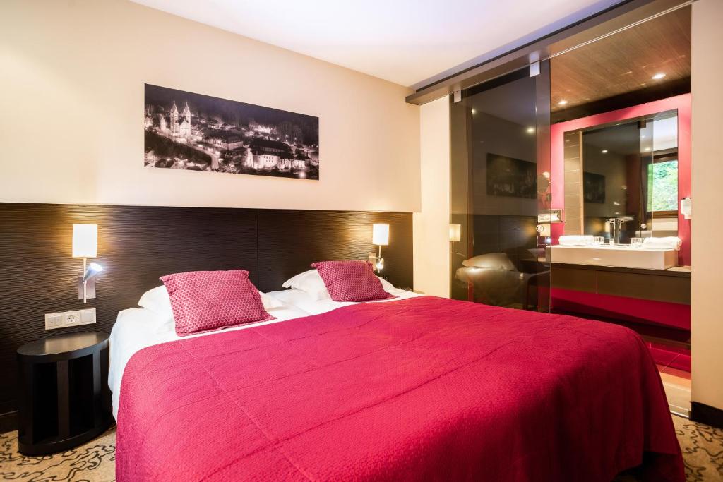 Postel nebo postele na pokoji v ubytování Koener Hotel & Spa