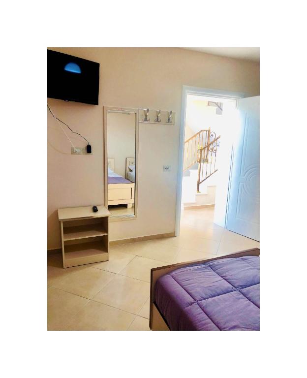 TV a/nebo společenská místnost v ubytování R HOTEL