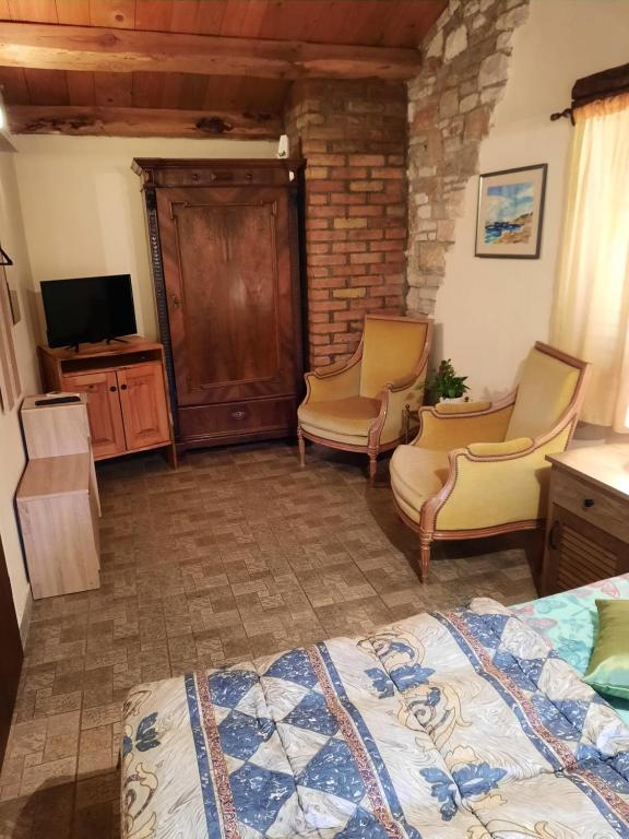 TV a/nebo společenská místnost v ubytování Rural Pension Istra Partner