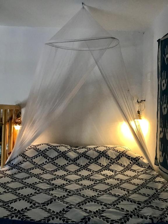 Postel nebo postele na pokoji v ubytování Chez Cécile Home
