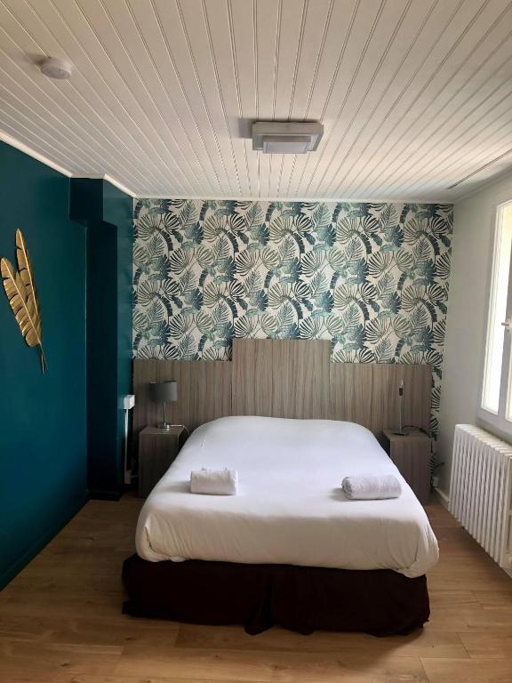 Postel nebo postele na pokoji v ubytování Hotel du Levant