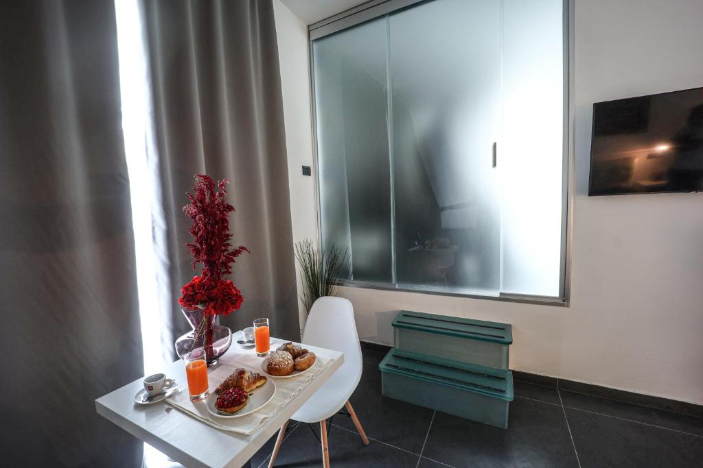 TV a/nebo společenská místnost v ubytování Residenza San Lorenzo