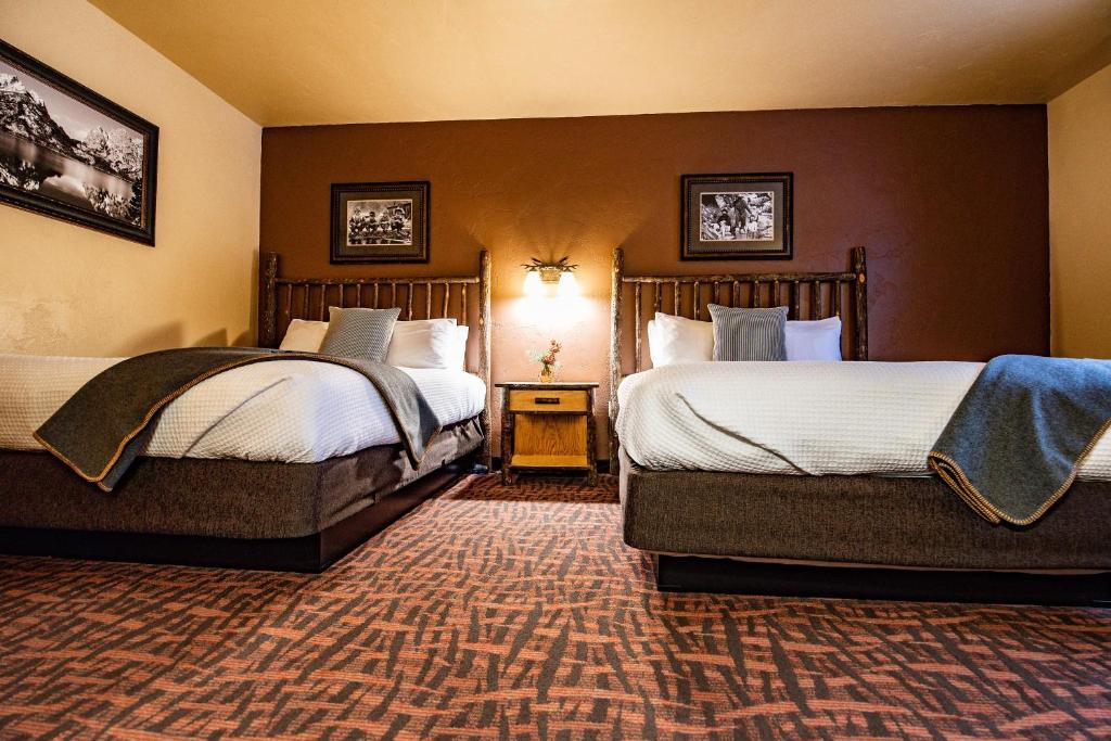 Postel nebo postele na pokoji v ubytování Elk Country Inn