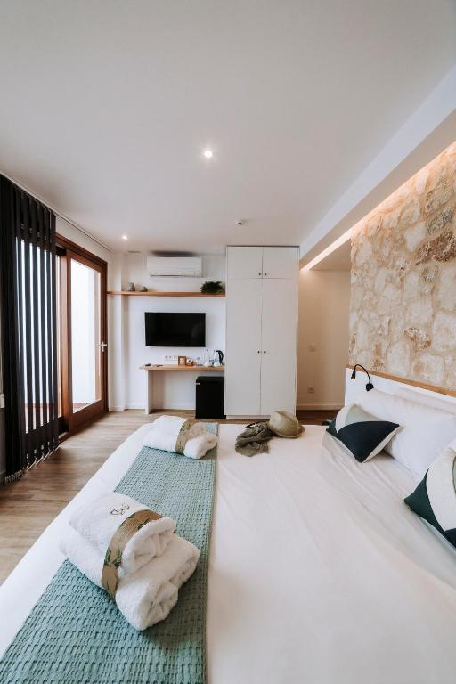 Postel nebo postele na pokoji v ubytování Murada hotel
