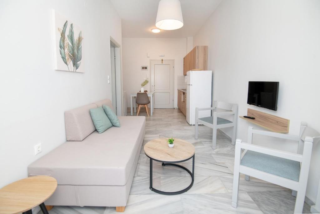 TV a/nebo společenská místnost v ubytování Mardinik Hotel Apartments