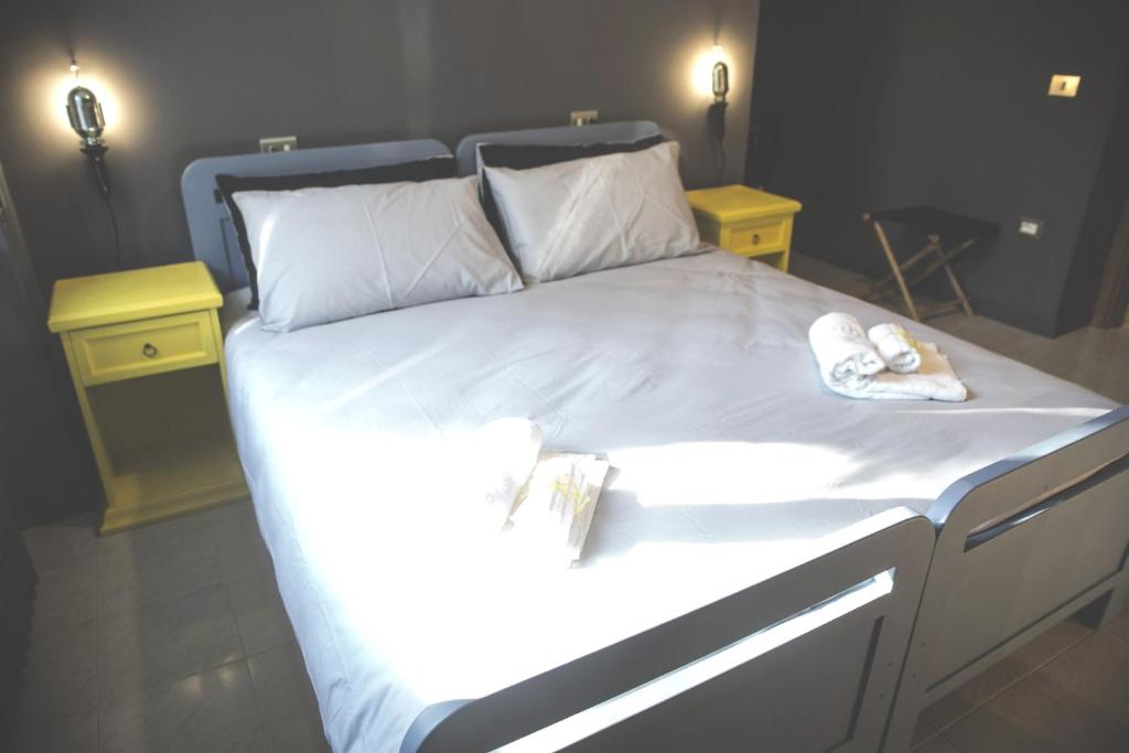 Postel nebo postele na pokoji v ubytování Lako Hostel
