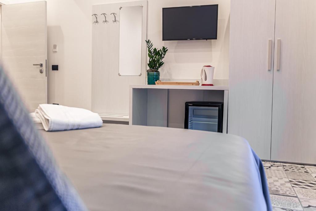 Postel nebo postele na pokoji v ubytování Residenza San Lorenzo