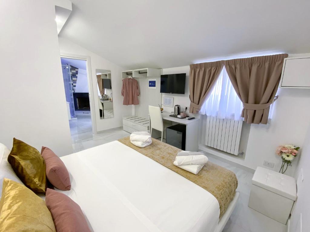 Villa Gabriella - Rooms & Breakfastにあるテレビまたはエンターテインメントセンター