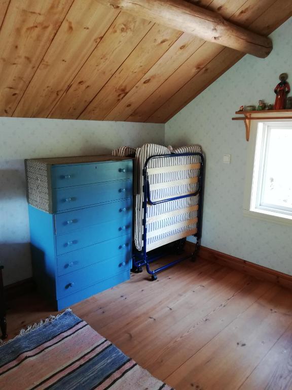 Postel nebo postele na pokoji v ubytování Bråttoms Härbre