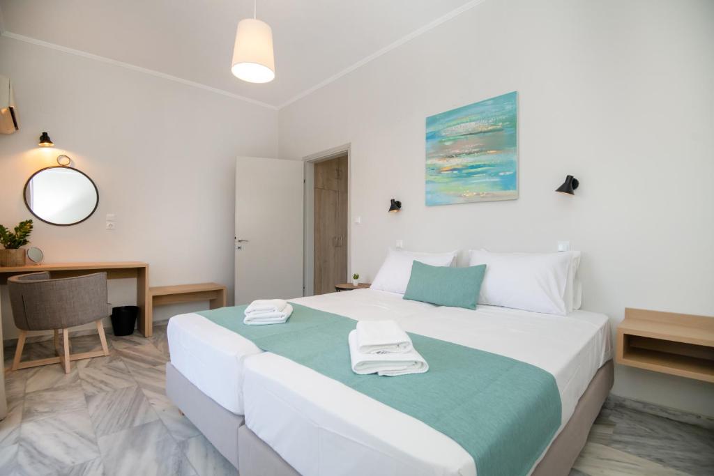 Postel nebo postele na pokoji v ubytování Mardinik Hotel Apartments