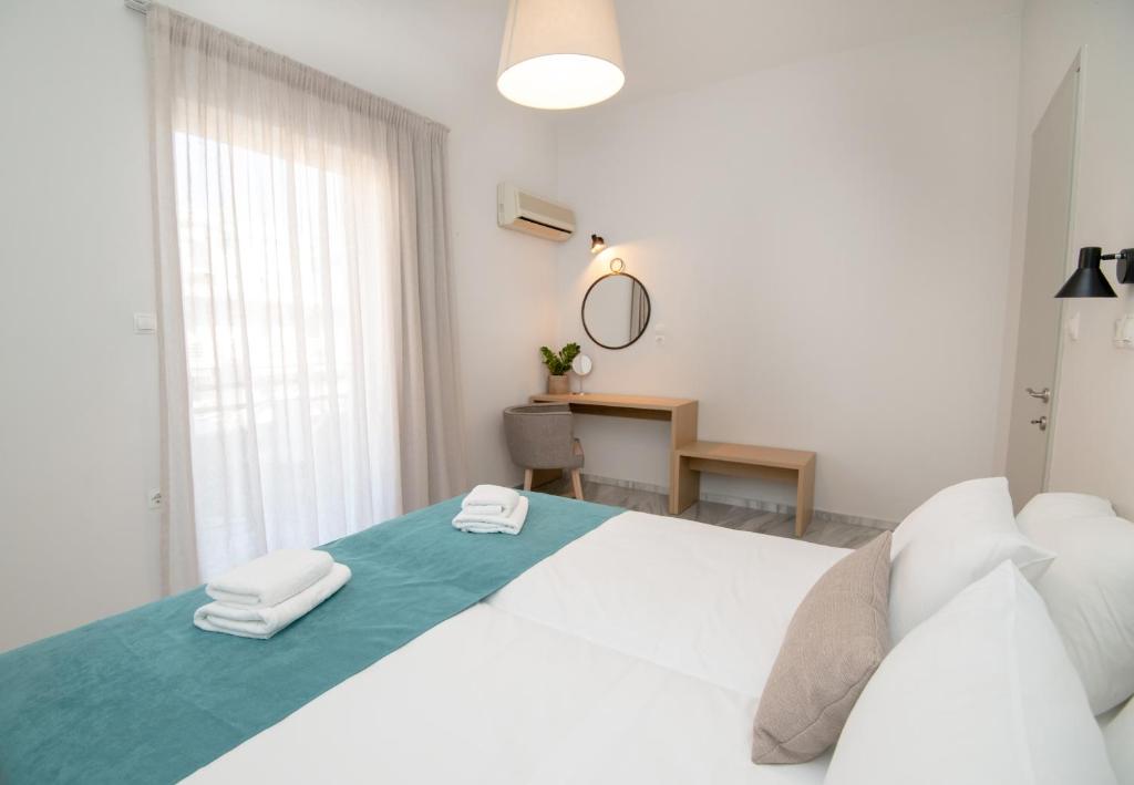 Postel nebo postele na pokoji v ubytování Mardinik Hotel Apartments