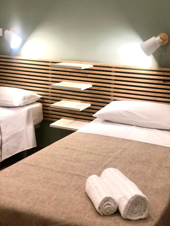 Postel nebo postele na pokoji v ubytování B&B Angolo83 Palermo centro