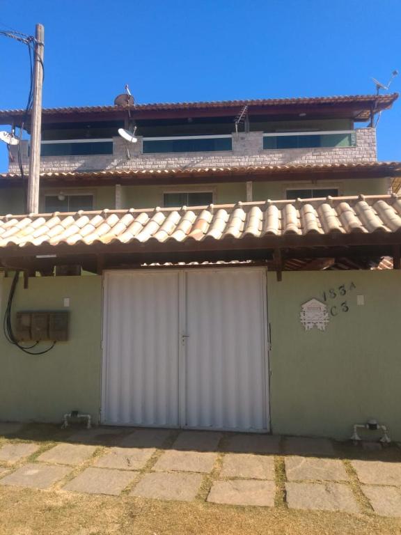 Foto de la galería de TRIPLEX PRAIA DO PERÓ en Cabo Frío