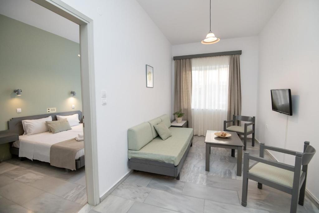 Postel nebo postele na pokoji v ubytování Mardinik Hotel Apartments