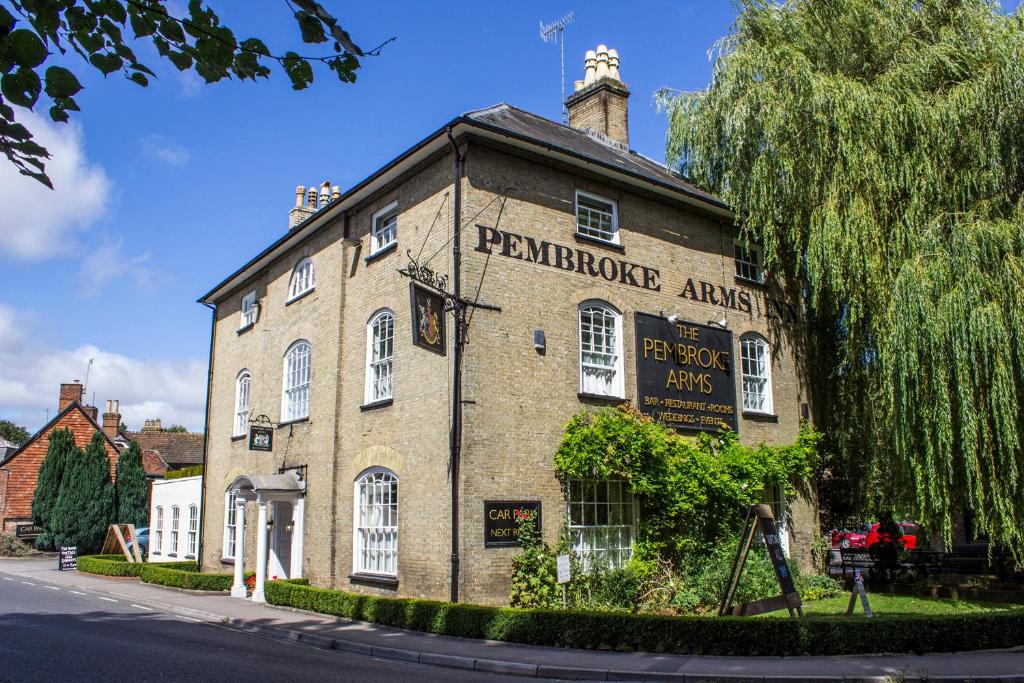 an old brick building on the side of a street at The Pembroke Arms in Salisbury