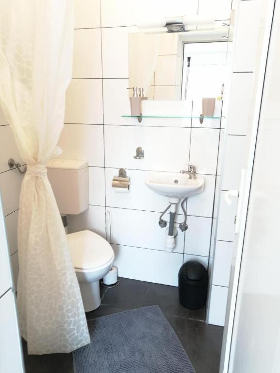 Koupelna v ubytování Apartmenthaus beim LKH Graz