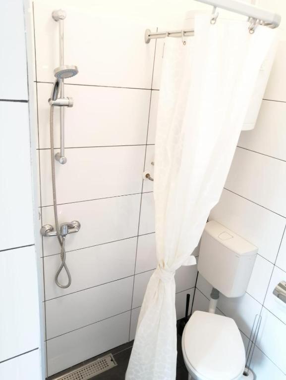 Koupelna v ubytování Apartmenthaus beim LKH Graz