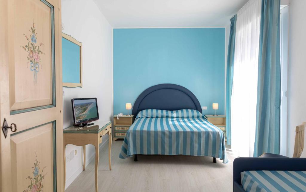 TV a/nebo společenská místnost v ubytování Hotel Paolina