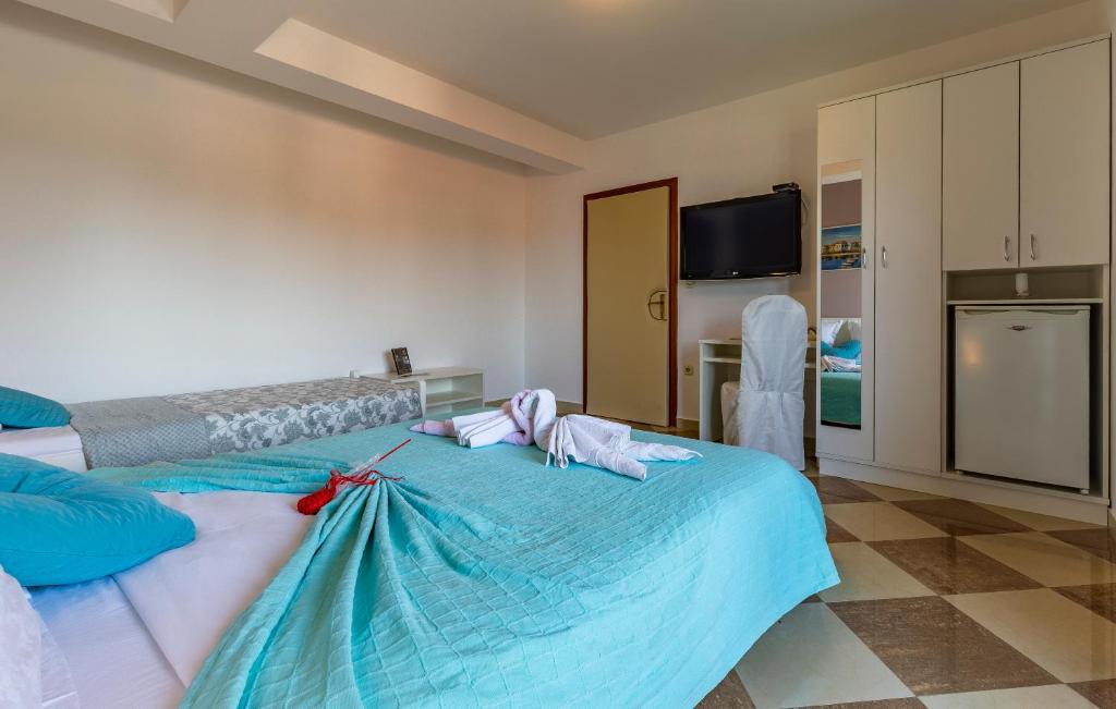 Postel nebo postele na pokoji v ubytování Villa San Rocco Bed & Breakfast
