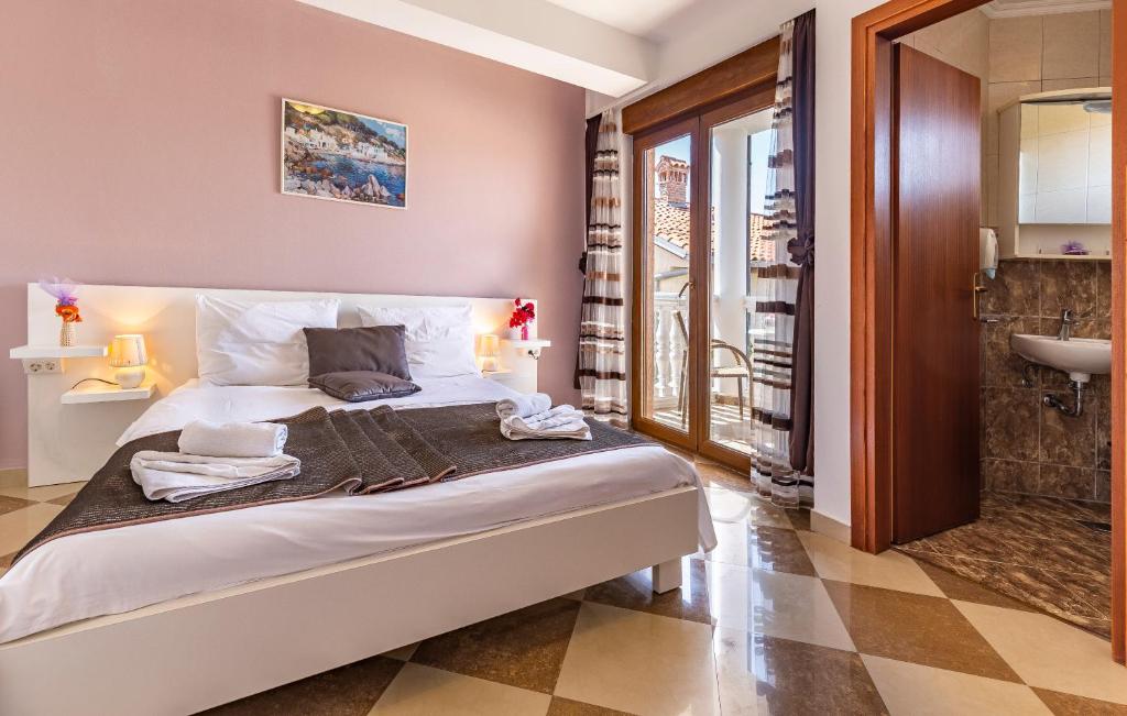 Postel nebo postele na pokoji v ubytování Villa San Rocco Bed & Breakfast
