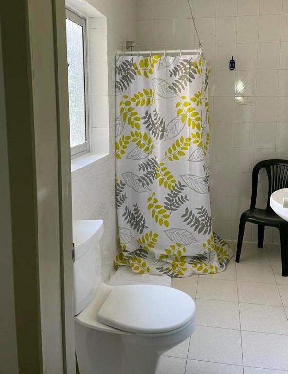 Koupelna v ubytování Roma Hotel