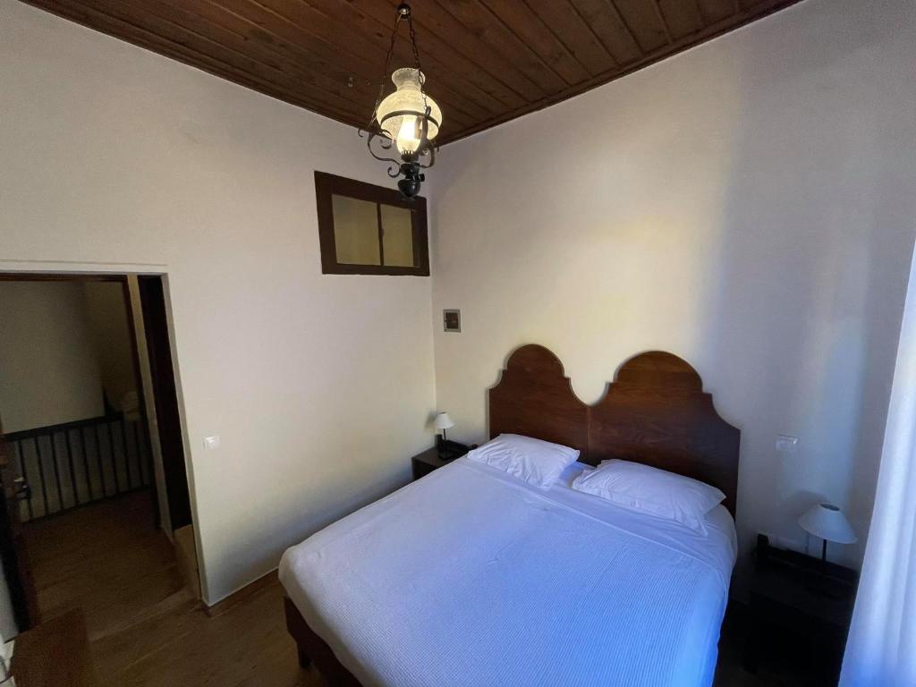 Postel nebo postele na pokoji v ubytování Captain Vasilis Hotel