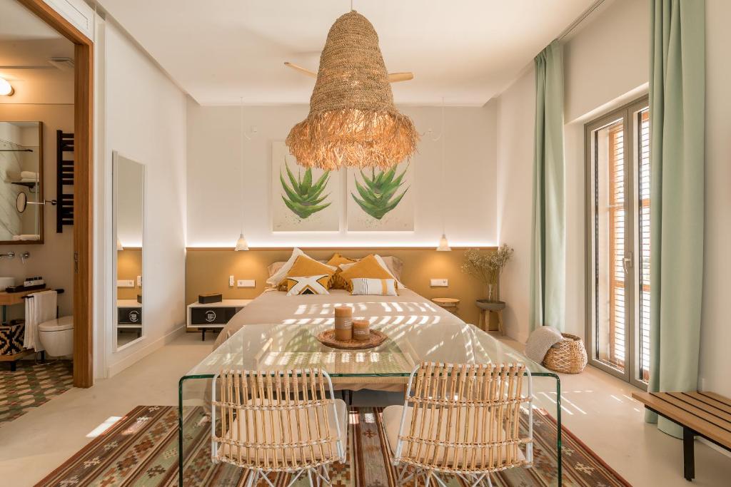 Postel nebo postele na pokoji v ubytování Hotel Portmany