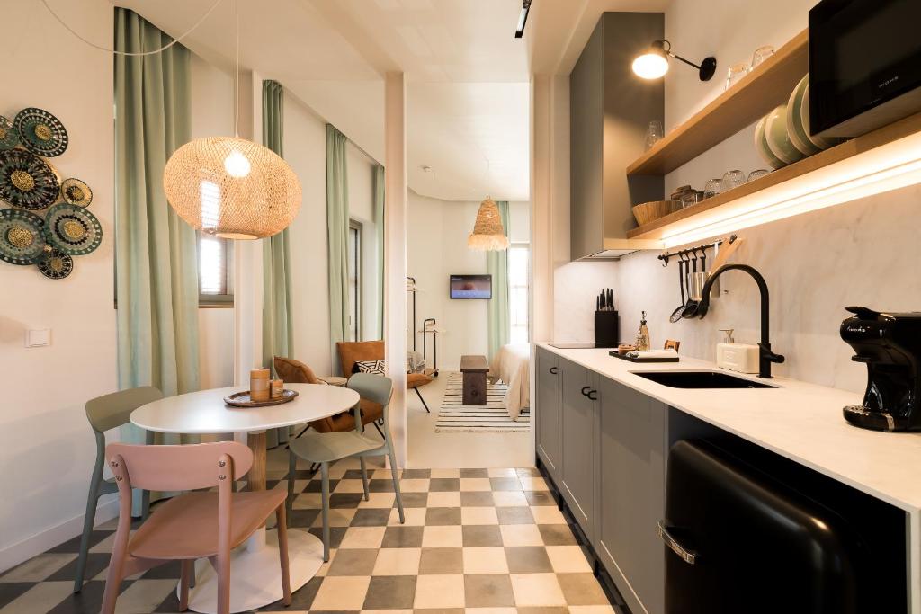 Kuchyň nebo kuchyňský kout v ubytování Hotel Portmany