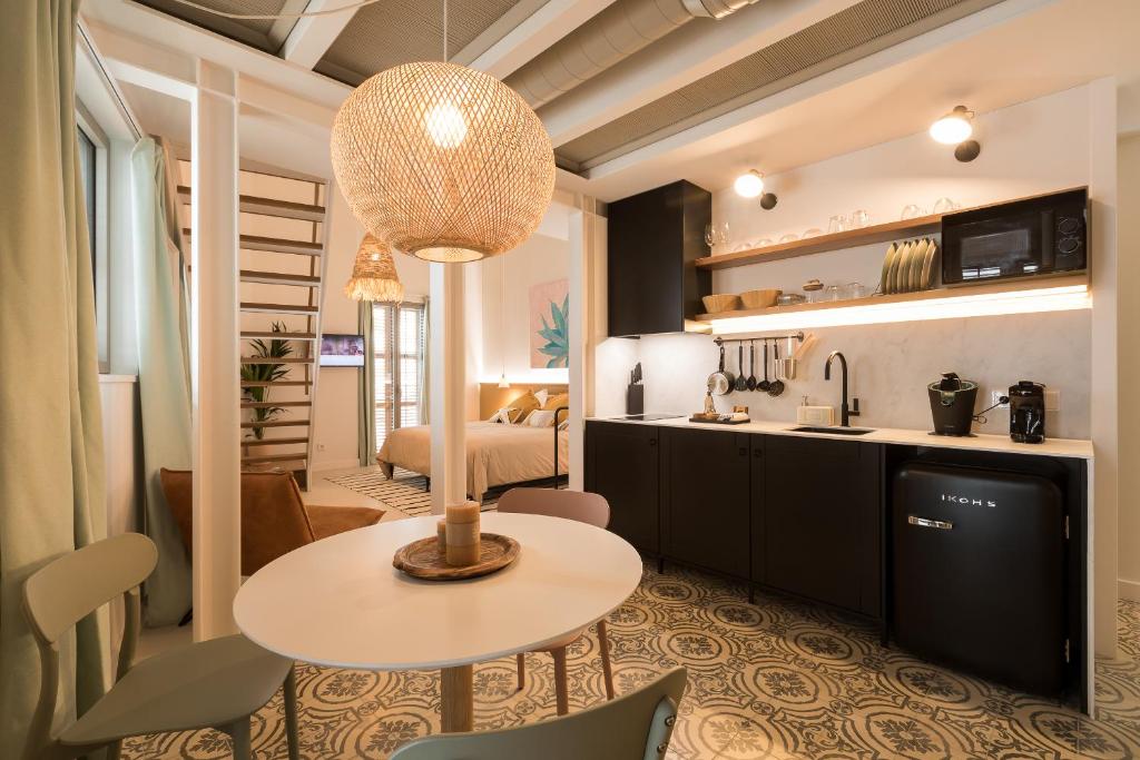 Kuchyň nebo kuchyňský kout v ubytování Hotel Portmany